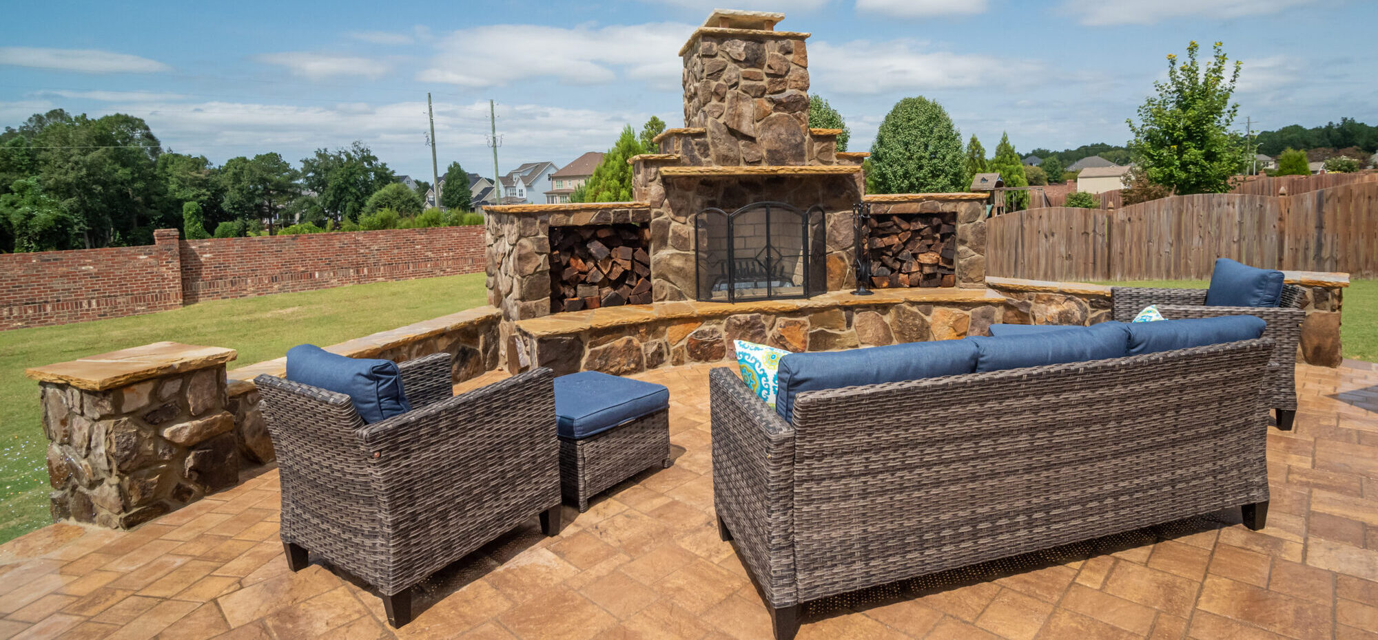 COVIS custom outdoor fireplace, patio pavers and retaining wall